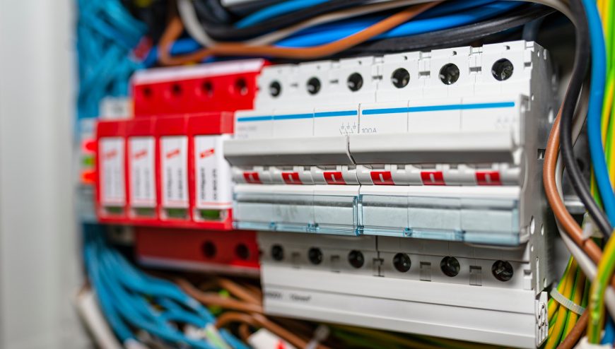 Three-phase fuse in the ON position and surge arrester.